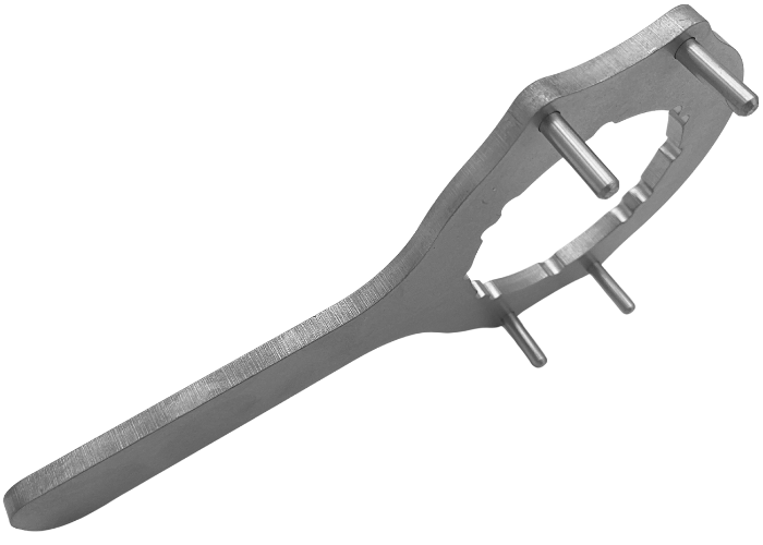 Spændenøgle til at spænde/løsne sort skruelåg til Airtrack Pro og til at montere reparationsventil.