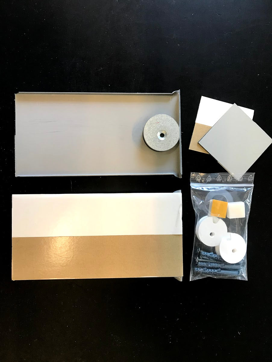 Skjult ophæng til spejle