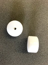 Afstandsklods til montering på væggen for at holde sidespejlet i rette position.